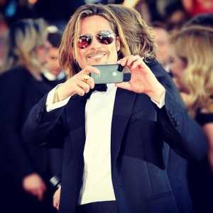 Brad Pitt likes iPhone 5 
